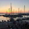 Sailboats at sunset in Naxos, Greece