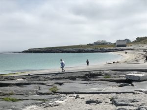 Beachcombers on Inis Oirr Beach, Ireland